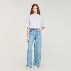 Jeans med vid ben och blommönster