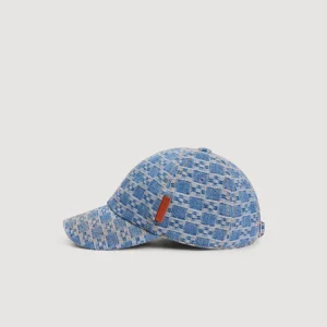 Jeanskeps med korsmönster