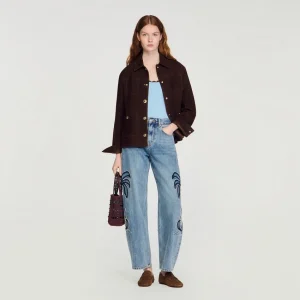 Jeans med bred passform och palmbroderi